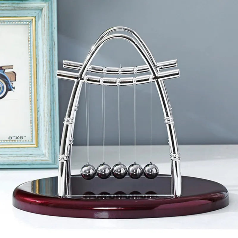 Desktop Newton's Cradle.  Add a sophisticated flare to your workspace!